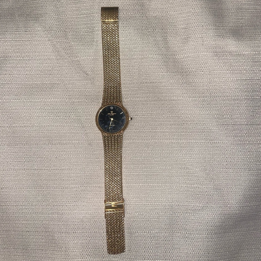 Jules jurgensen gold-tone stainless steel watch adjustable band.